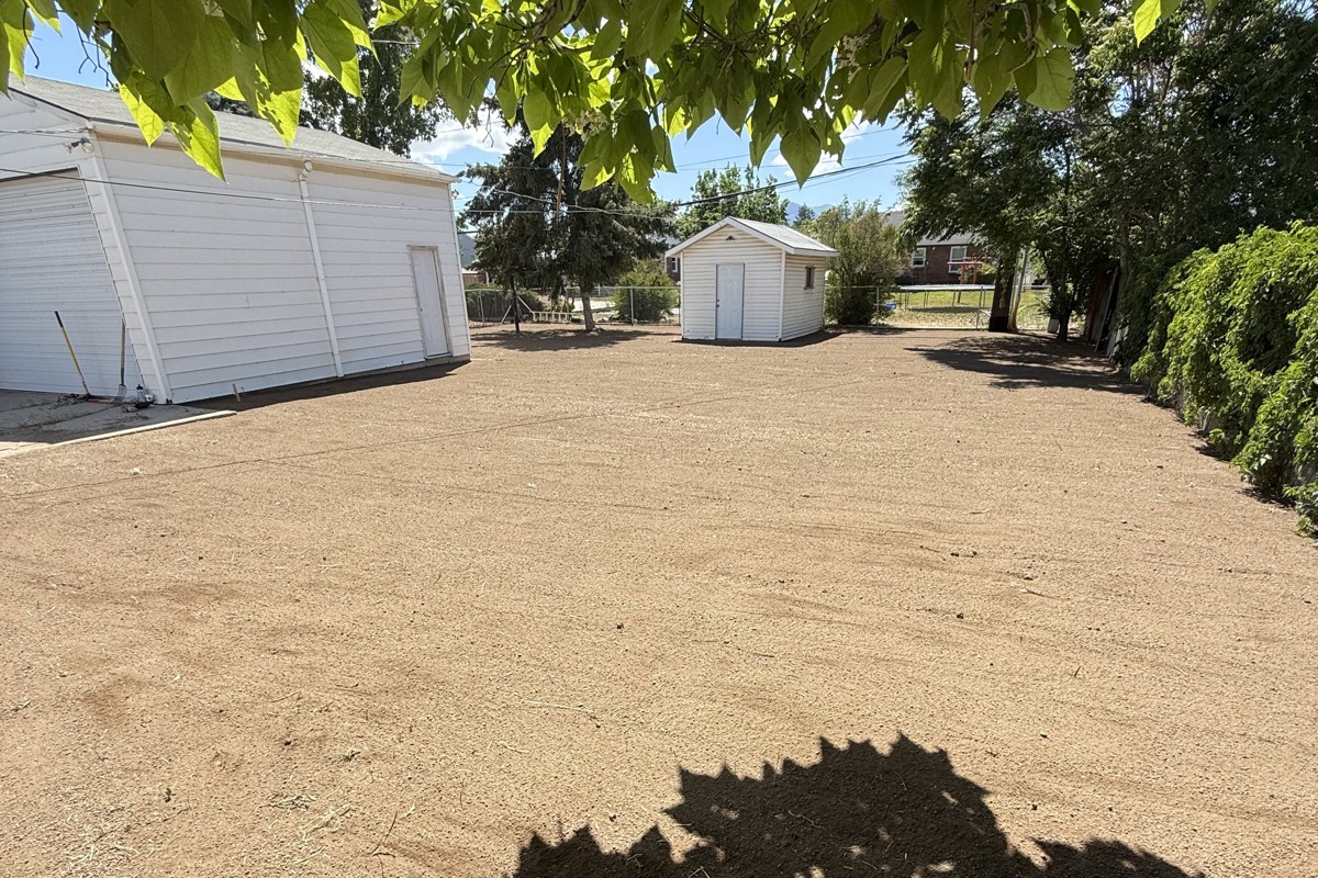 A yard graded and prepped ahead of sod installation by Stauffer Custom Contracting